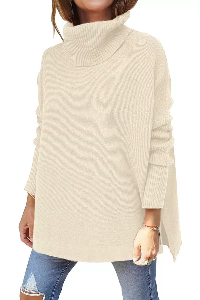 Light khaki ribbed knit turtleneck tunic sweater, batwing sleeves, side slit hem