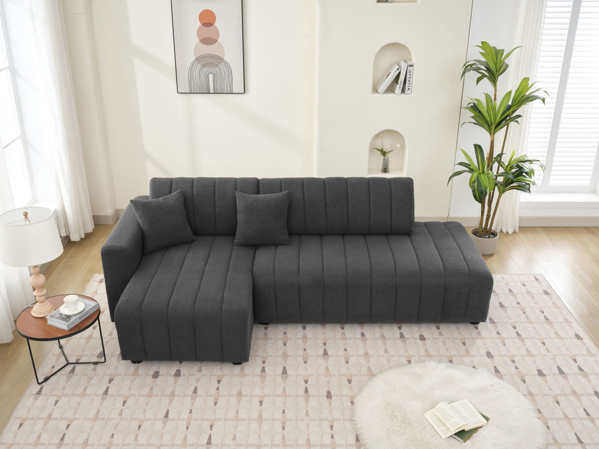 Dark gray sectional sofa with chaise, square armrests and layered cushion look