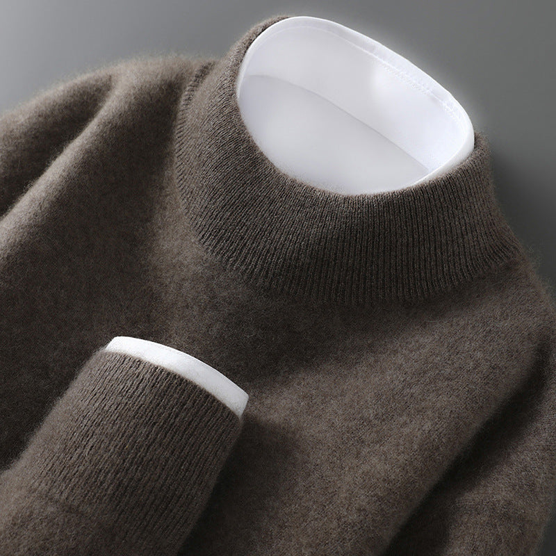 Men's cashmere base-layer sweater in dark brown, crew neck with ribbed collar and cuffs.