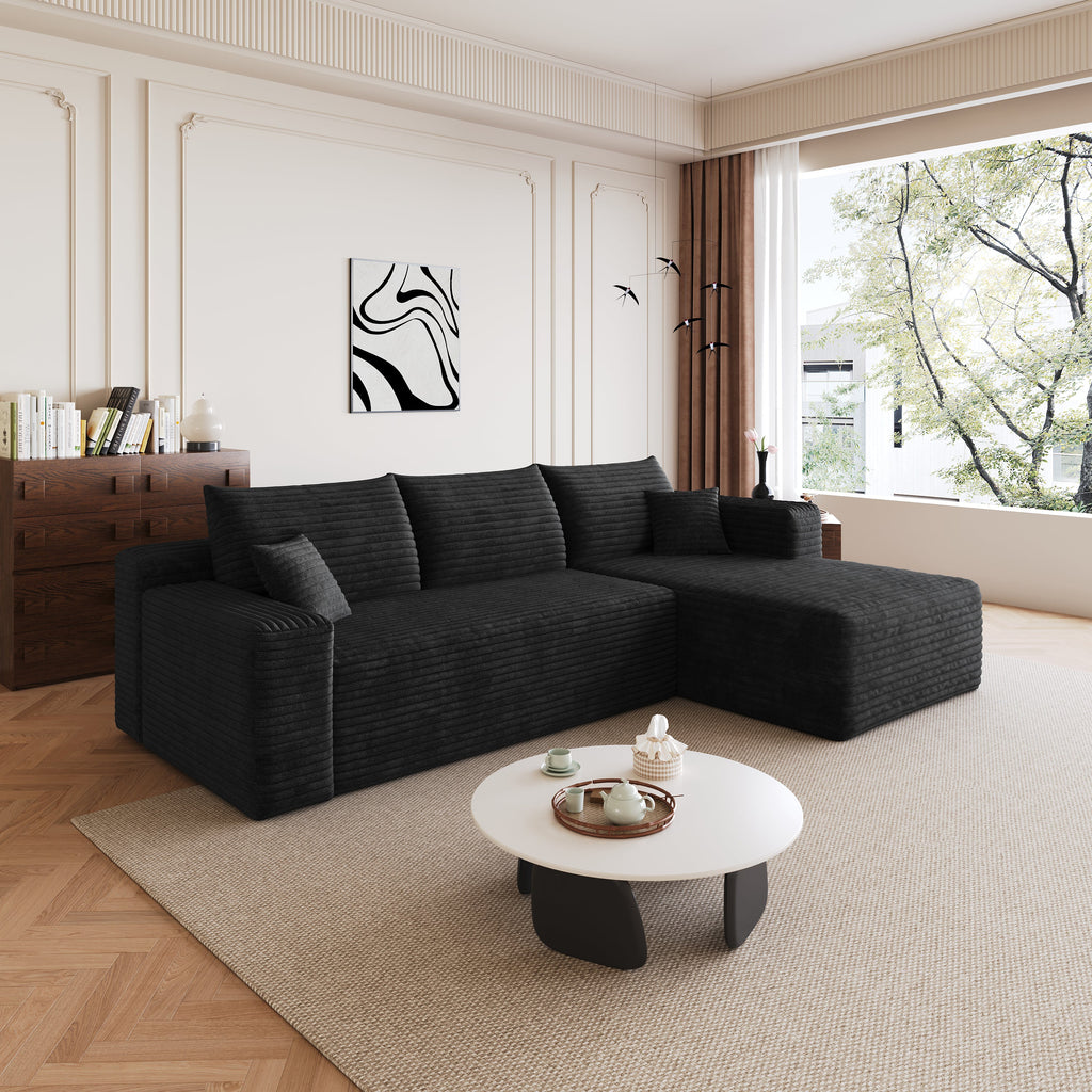 Black corduroy sectional sofa with right chaise corner and back cushions