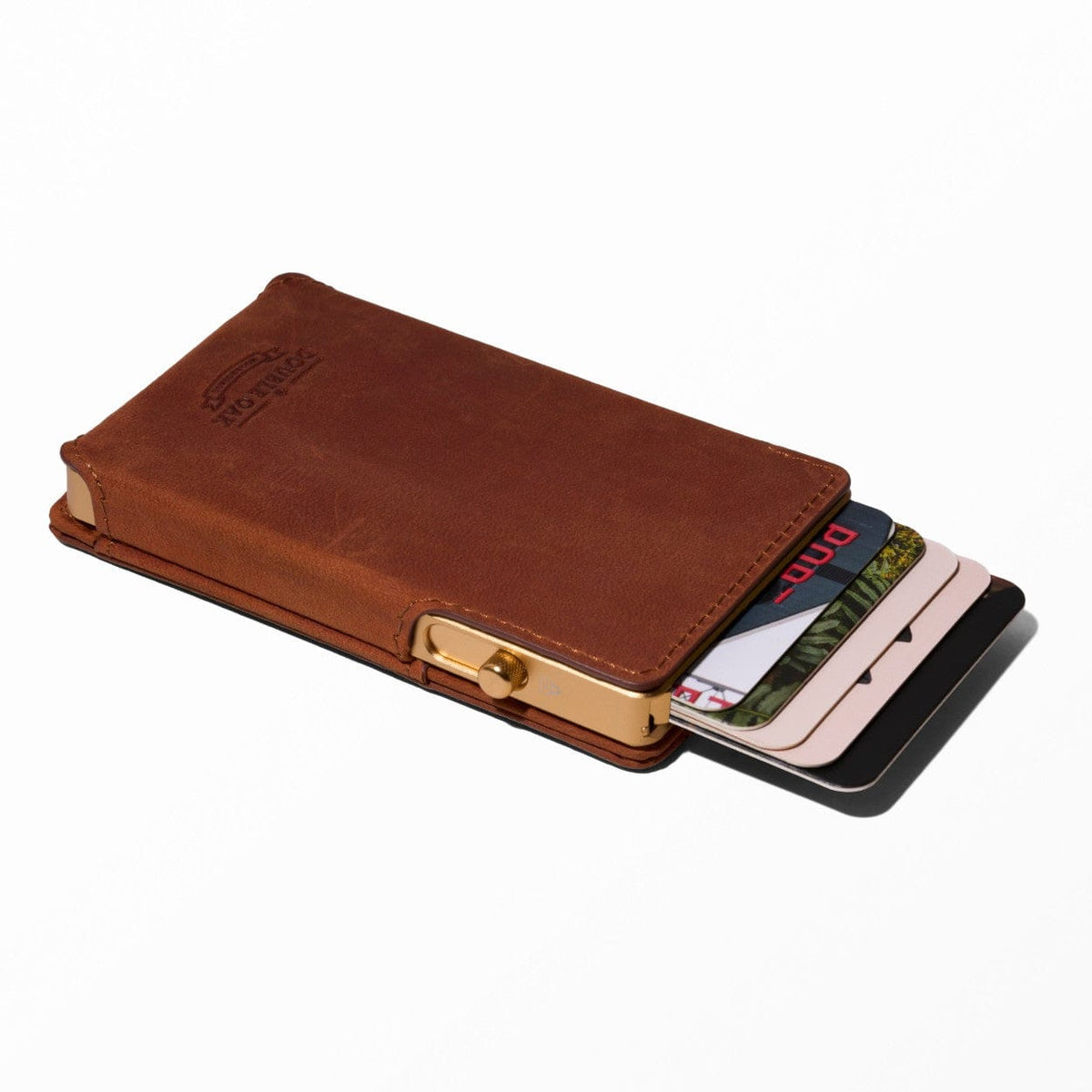 Brown leather bifold wallet with card slots and gold tone snap closure