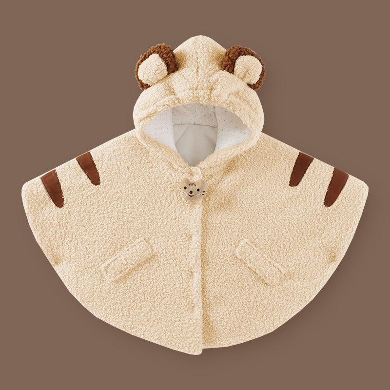 Cream hooded plush cape with bear ears, brown stripes, and small bunny emblem