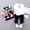 Boys' three-piece outfit with abstract print jacket, white shirt, and black pants