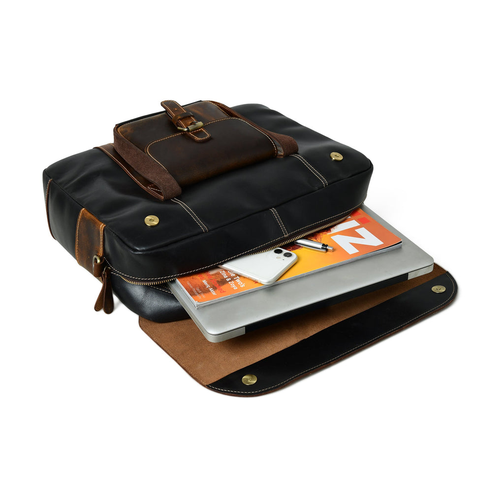 Black-brown leather travel bag with top flap holding a laptop on the base