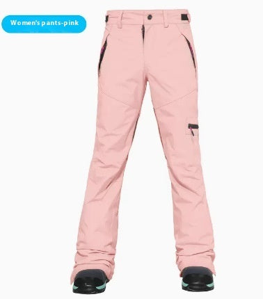 Women's ski pants in pink, slim fit with side pocket and snow cuff details