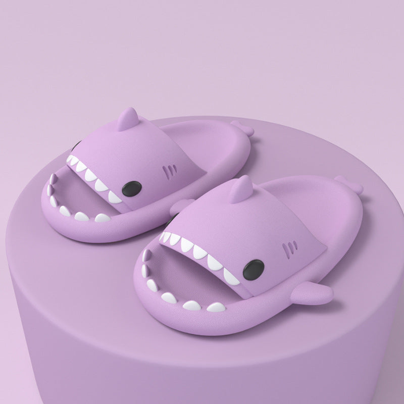 Purple shark-shaped slide sandals, open toe with molded fin and white tooth detail