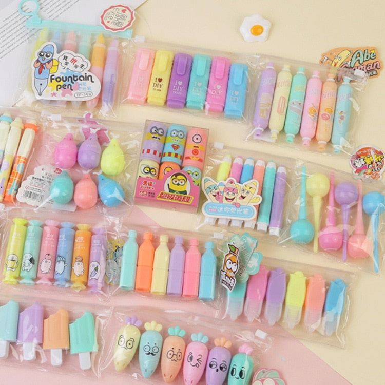 Pastel cute mini highlighter markers, capsule and cartoon designs in clear packs.