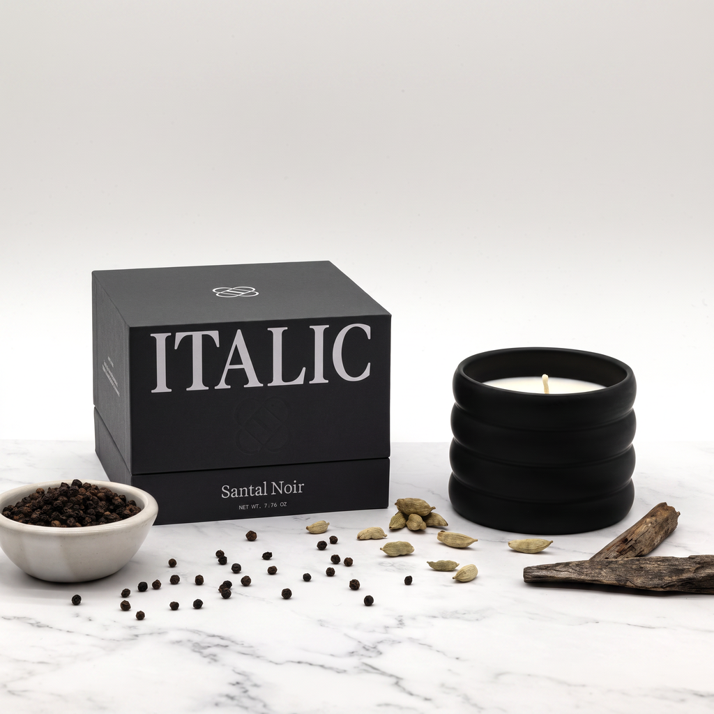 Santal Noir soy wax ceramic candle with lit wick and dark gift box