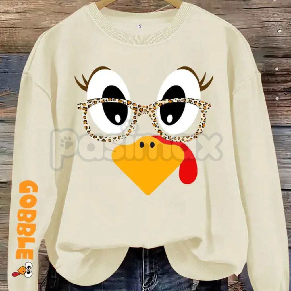 Light beige women's crewneck pullover sweater with cartoon turkey face and glasses print