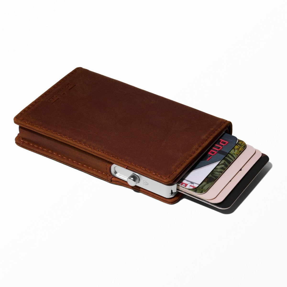Brown leather bifold wallet with card slots and silver tone snap closure