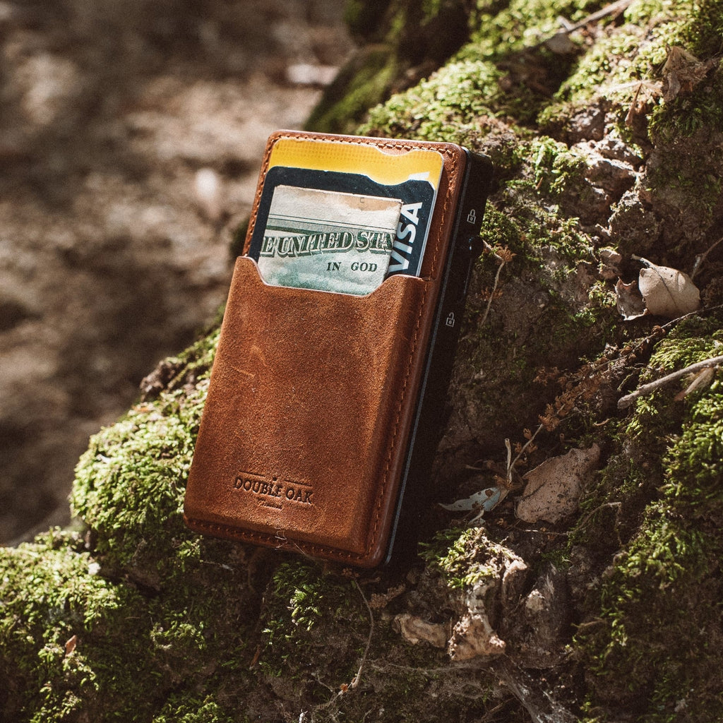 Brown leather mod wallet with card showing in front pocket