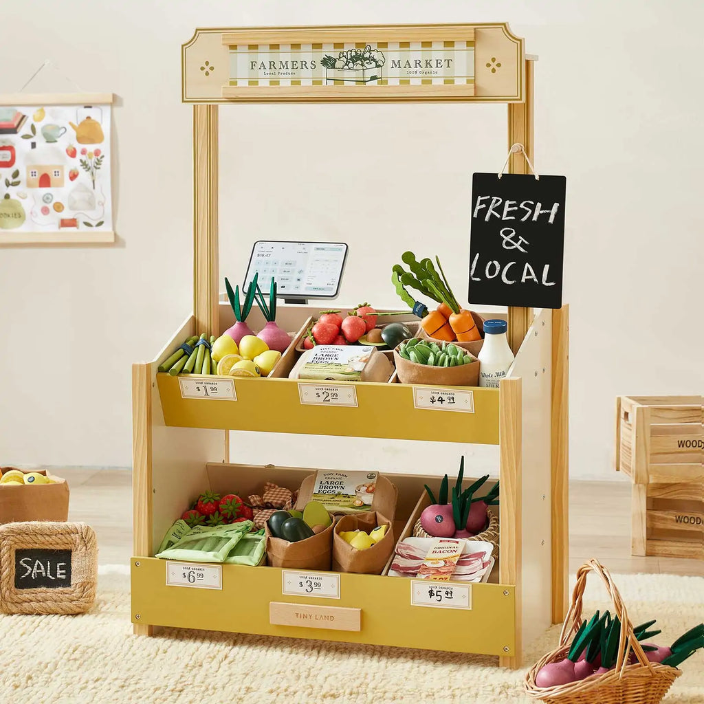 Tiny Land® kids grocery store playset with open produce shelves and chalk sign