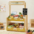 Tiny Land® kids grocery store playset with open produce shelves and chalk sign