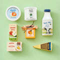 Pretend organic dairy play food set with milk bottle, cheese spread tub, butter and cheese