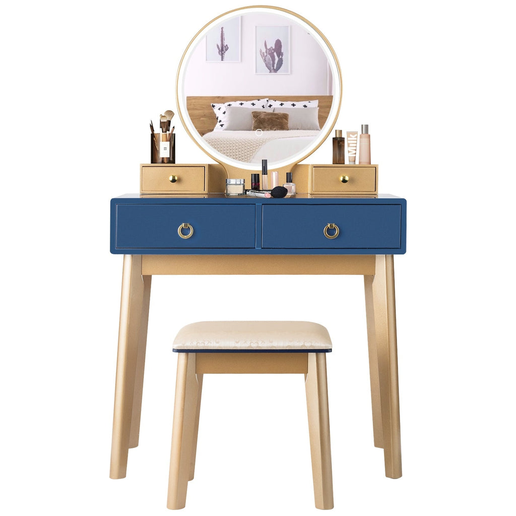 Makeup vanity table set with round illuminated mirror, blue drawers, and beige stool
