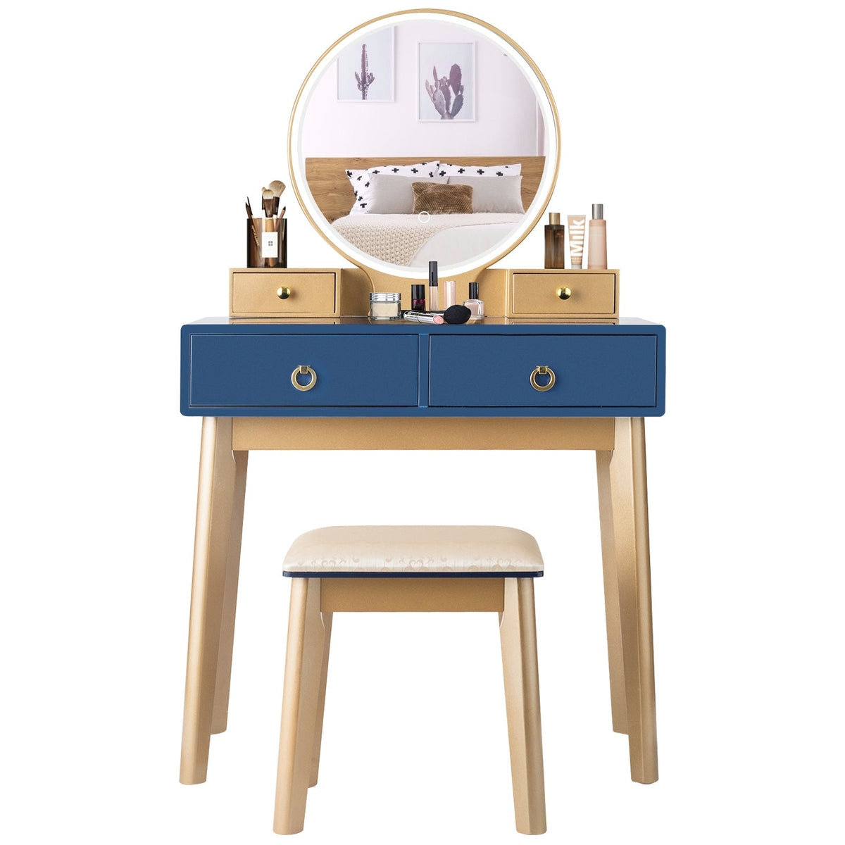Makeup vanity table set with round illuminated mirror, blue drawers, and beige stool