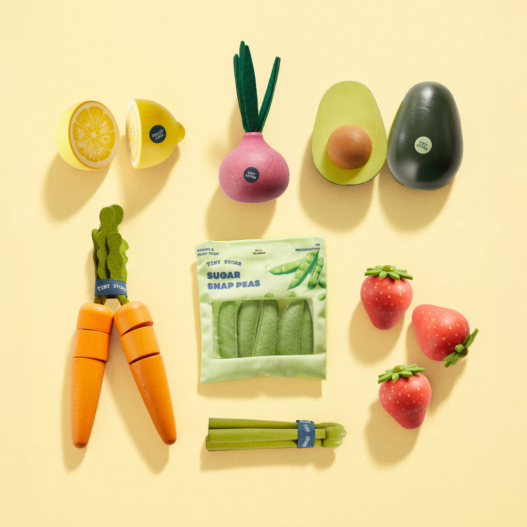Toy organic fruit and veggie play set with snap pieces and sealed pouch