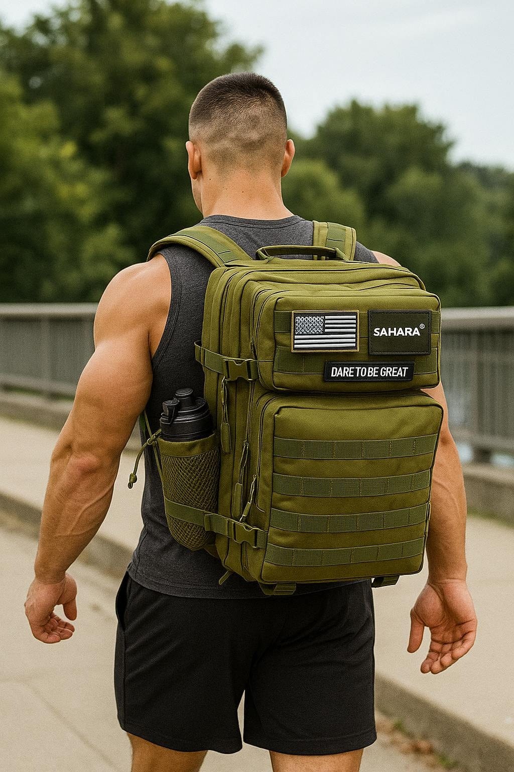 Olive green travel and laptop backpack worn on back with front organizer pockets