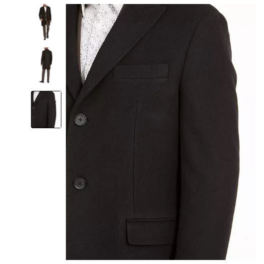 Black overcoat close-up: single-breasted button placket and welt chest pocket