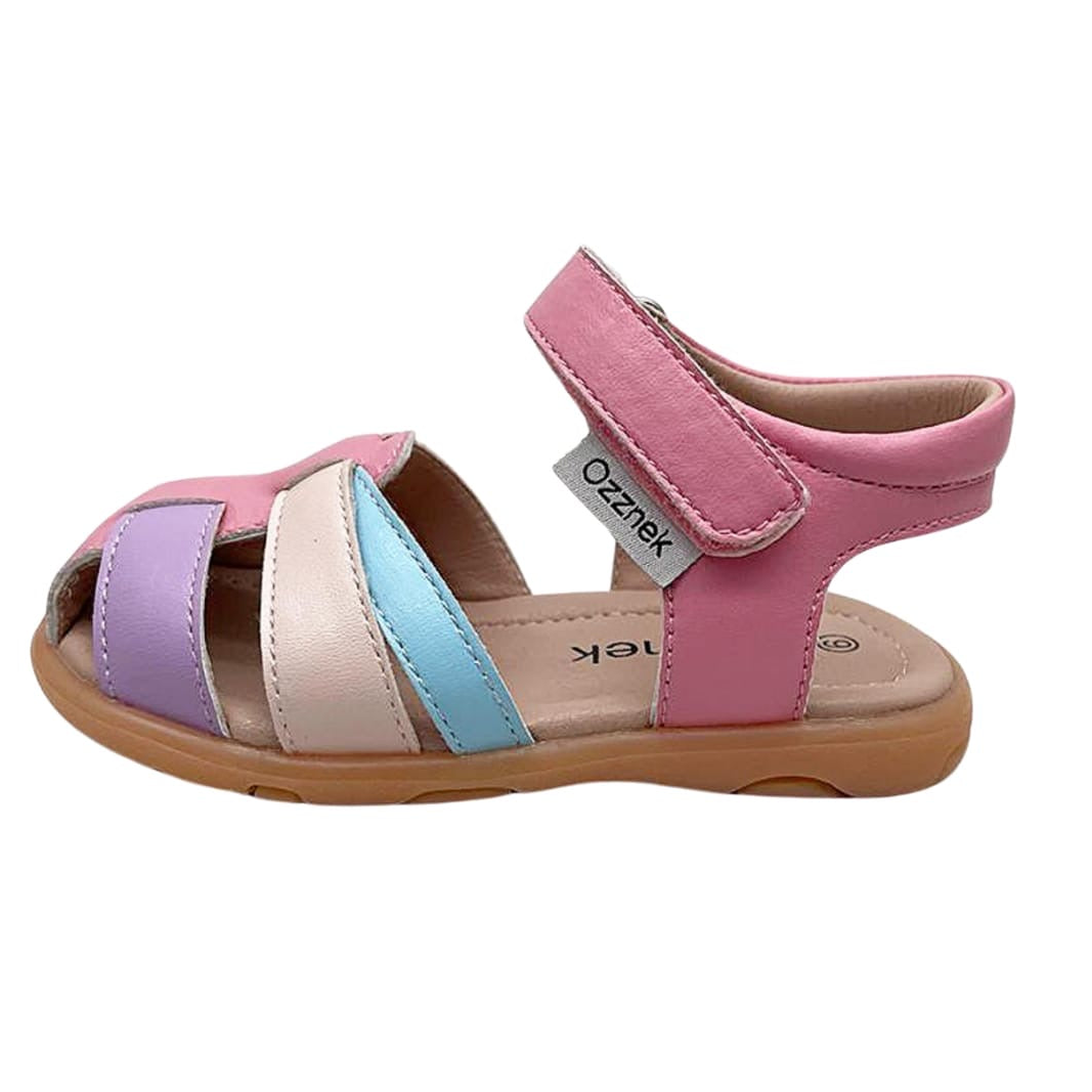 Kids closed-toe sandal side view in pink with lilac, beige, and blue strap bands