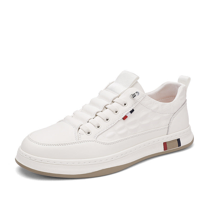 White lace-up low-top sneakers with padded collar and contrast stripe detail.