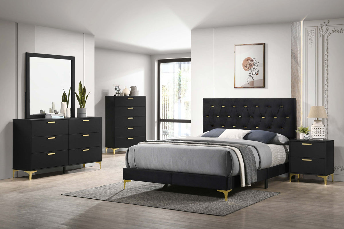 Black upholstered platform bed with tufted headboard, footboard, and gold legs