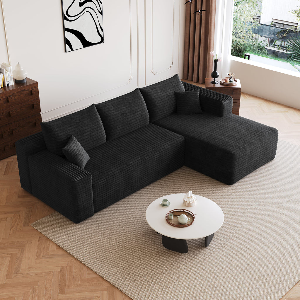 Black corduroy sectional sofa with L chaise, firm armrests, and deep seat cushions