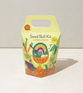 DIY seed ball kit box with Rainbow Garden multicolor artwork and handle cutout