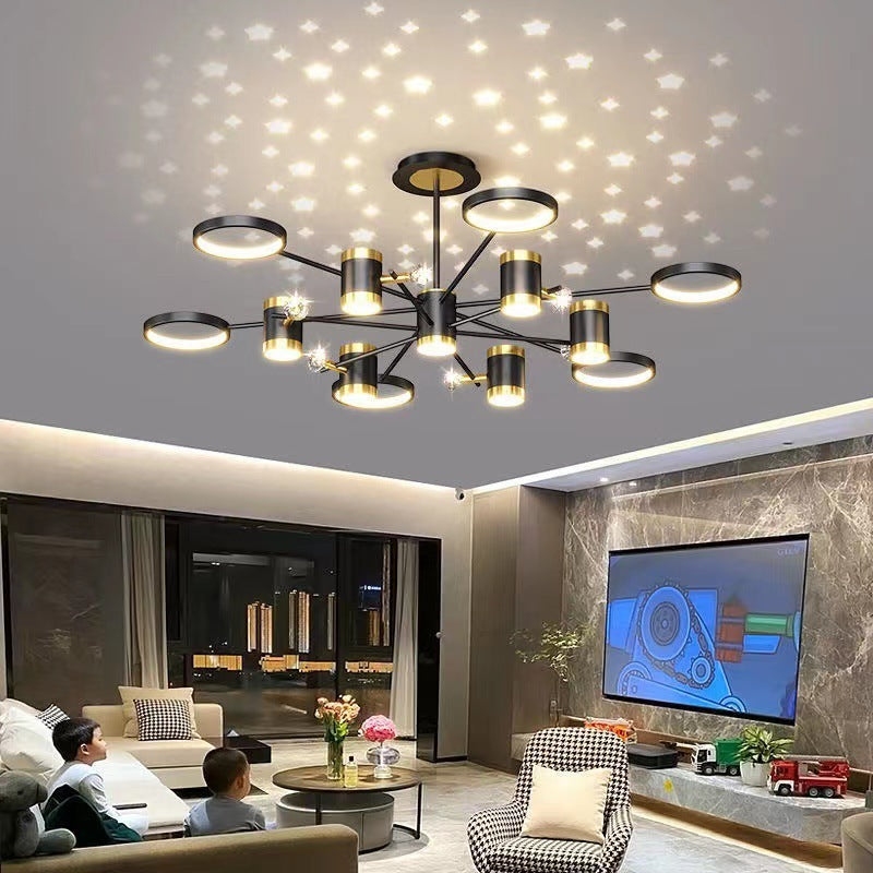 Black and gold 13-light star ceiling chandelier with multiple glowing round shades