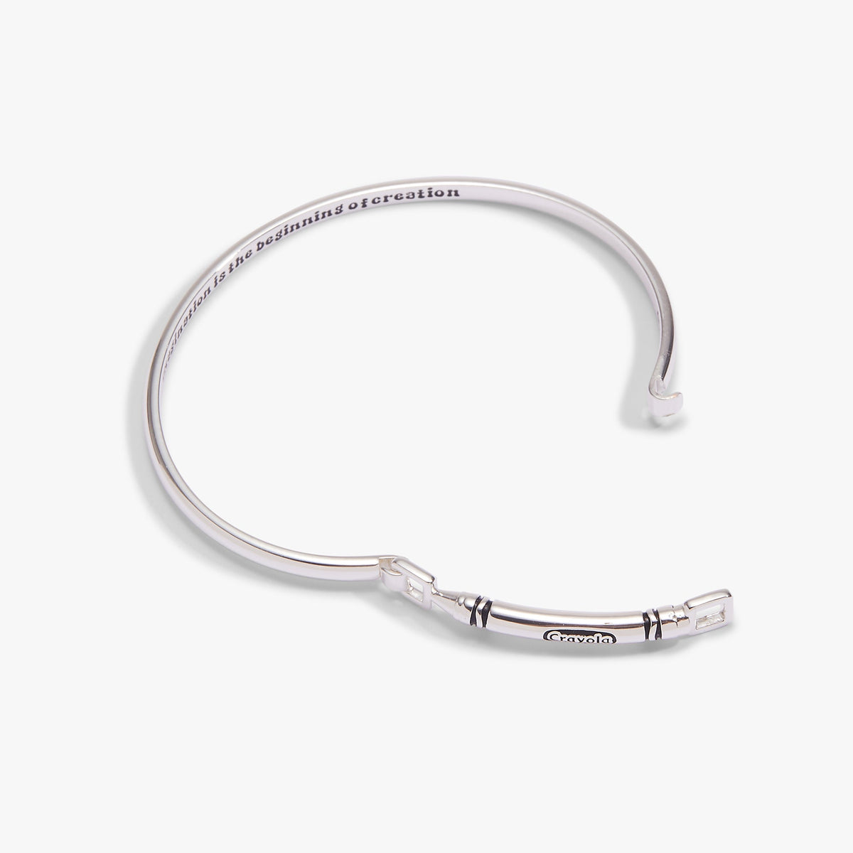Silver Crayola crayon tension bangle with square clasp and engraved slogan
