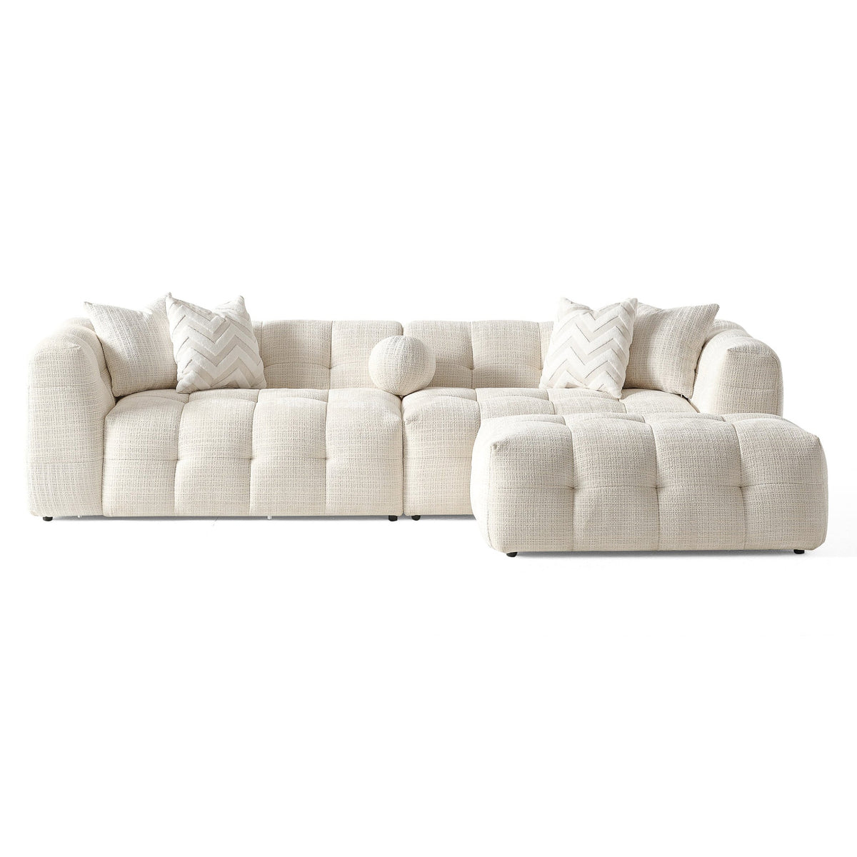 Light-colored tufted sectional sofa set with chaise ottoman-style footrest