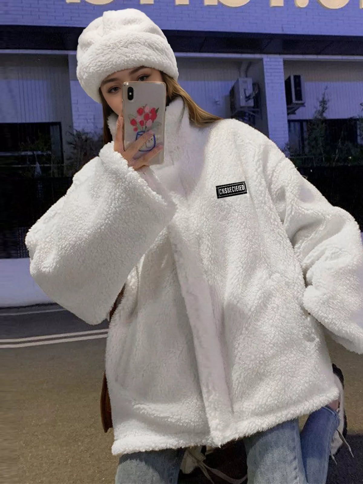 White sherpa fleece zip-up jacket with stand collar and side pockets, front view