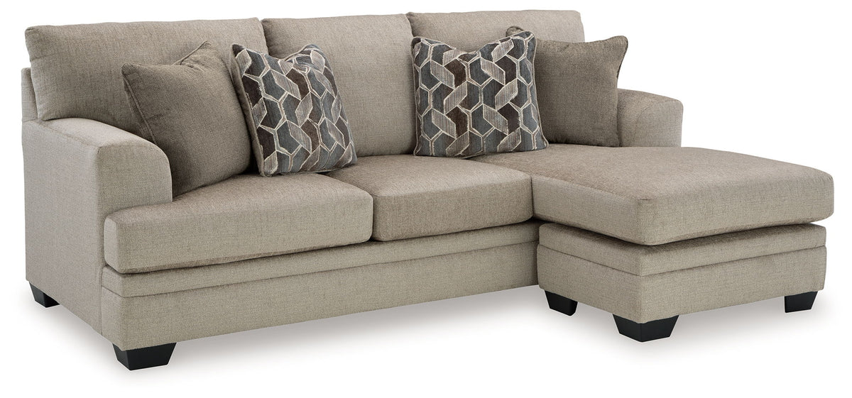 Stonemeade sectional sofa with chaise, upholstered in light taupe with accent pillows