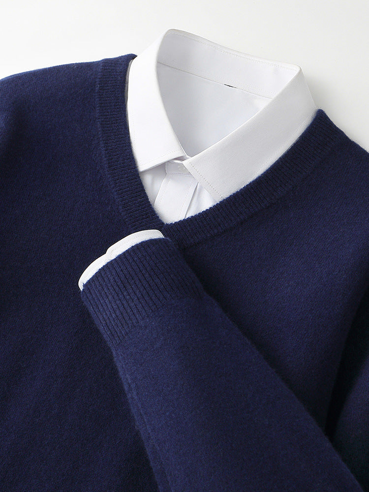 Dark blue V-neck cashmere sweater with ribbed cuffs and thick knit texture