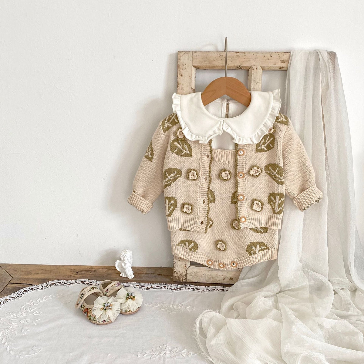 Children's cream leaf-jacquard sweater with white ruffled collar and button front knit