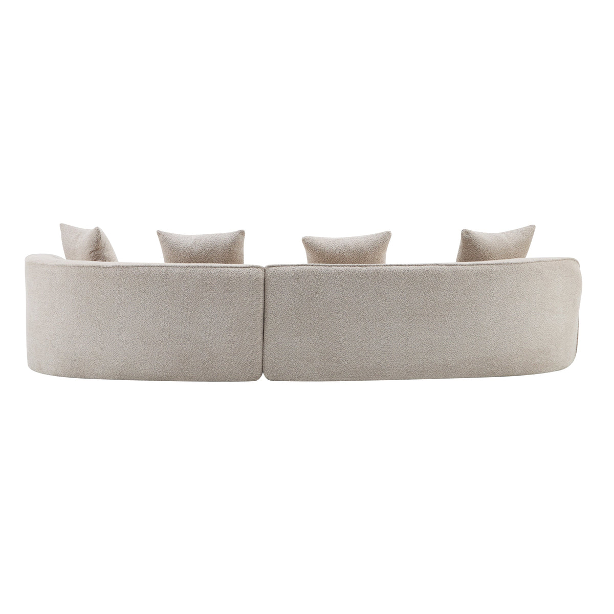Light beige curved sectional sofa with central seam and four throw pillows
