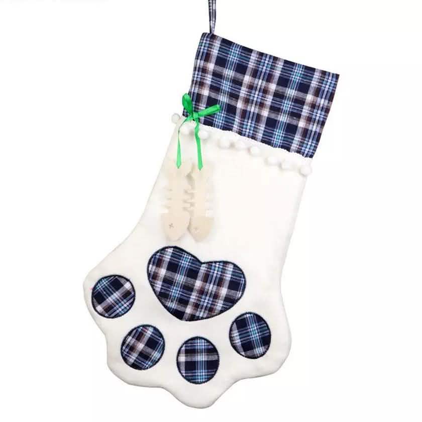 Blue plaid pet paw hanging Christmas stocking with white background and paw-print patch