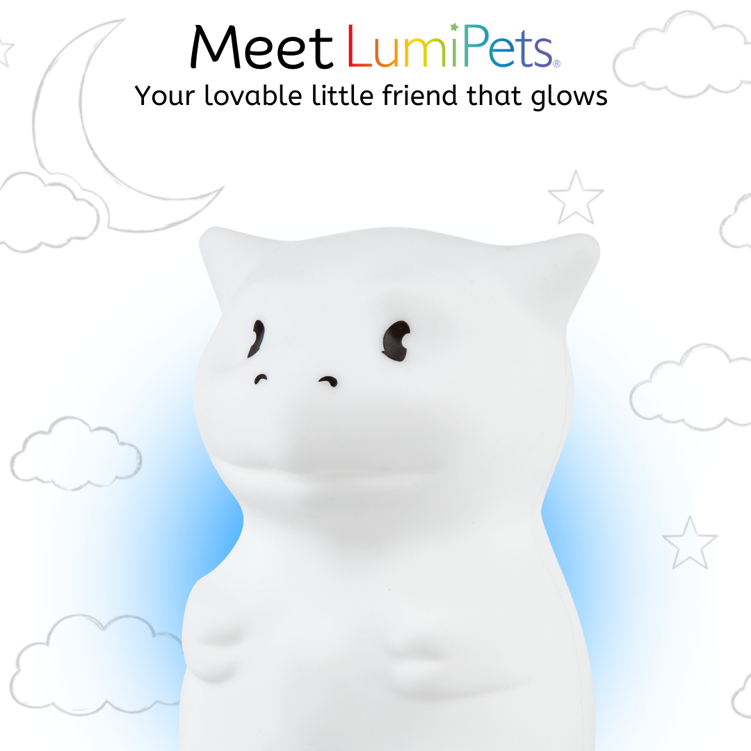 White silicone dragon night light with soft blue glow, front view