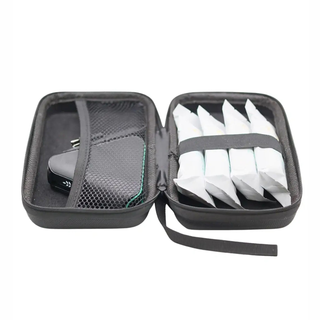 Open black travel case with mesh organizer pocket and elastic strap holding wipes