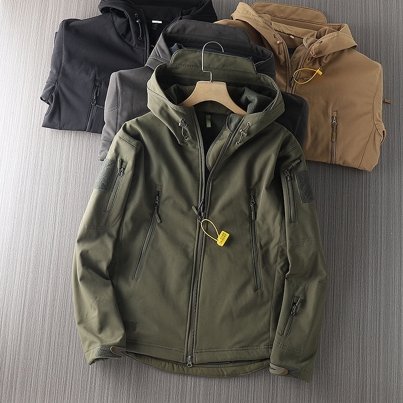 Men's waterproof shell jacket in dark olive green, front zip, hood, and chest tag