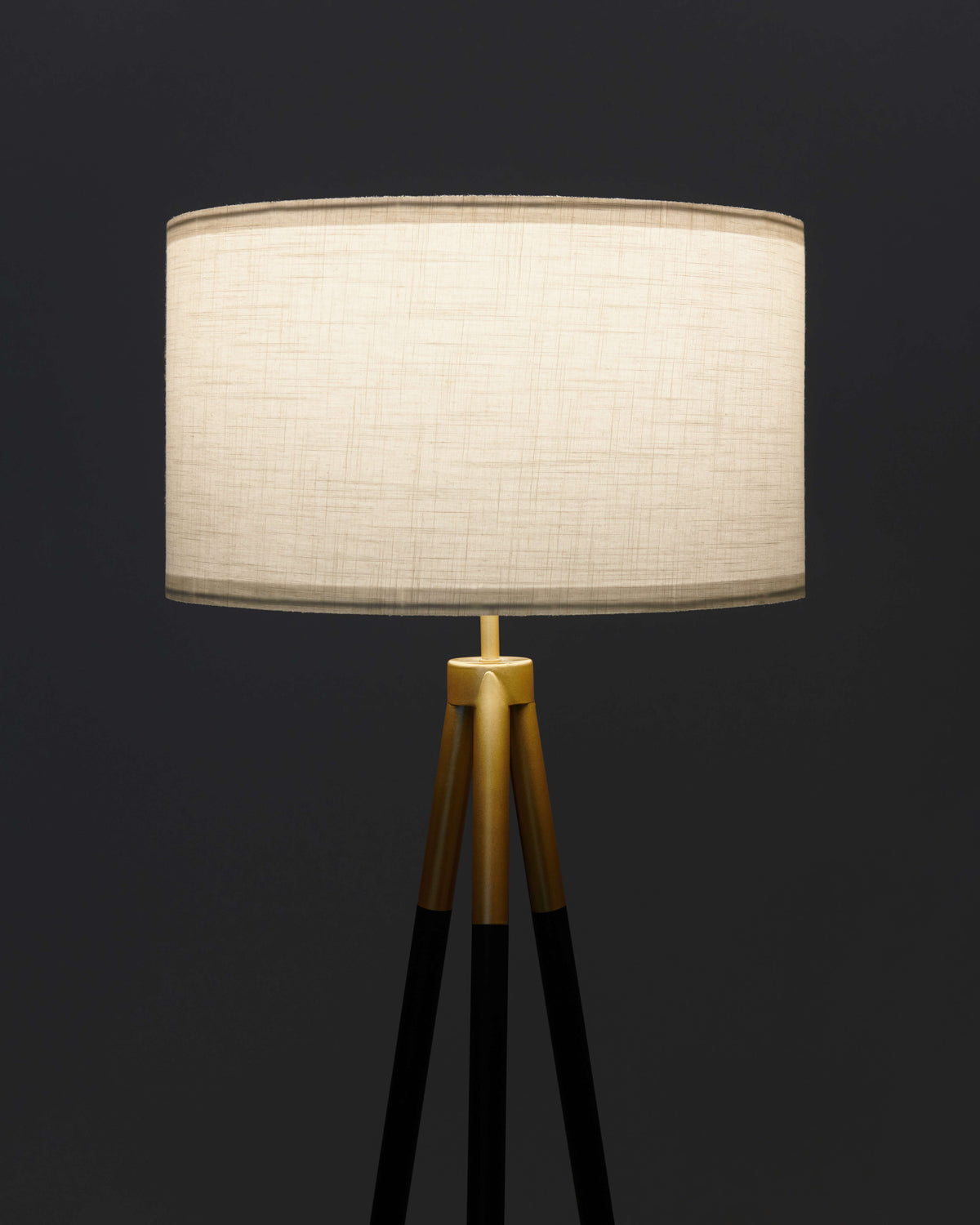 Levi floor lamp with cream drum shade and gold tripod legs