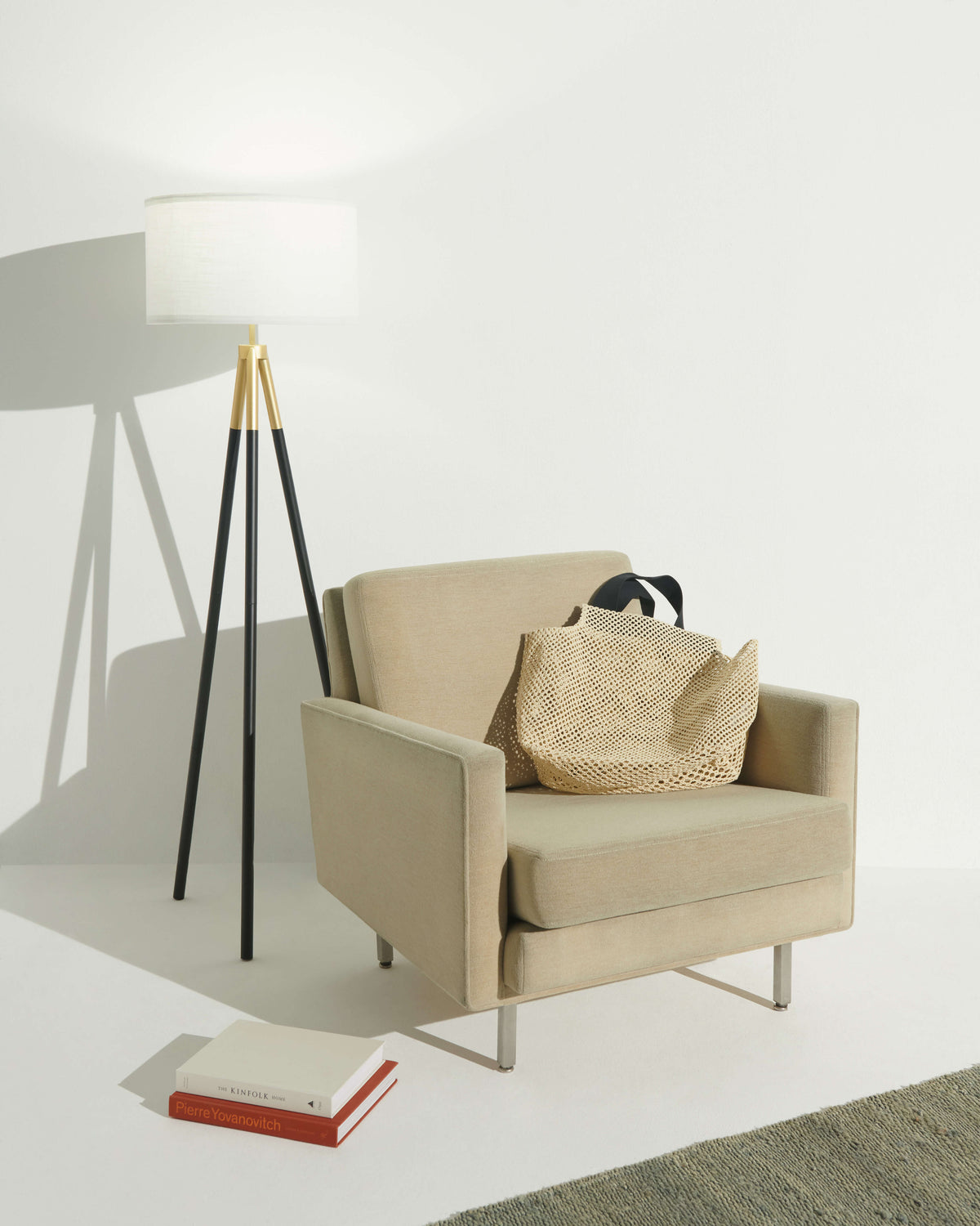 Levi floor lamp with white fabric drum shade and black tripod legs