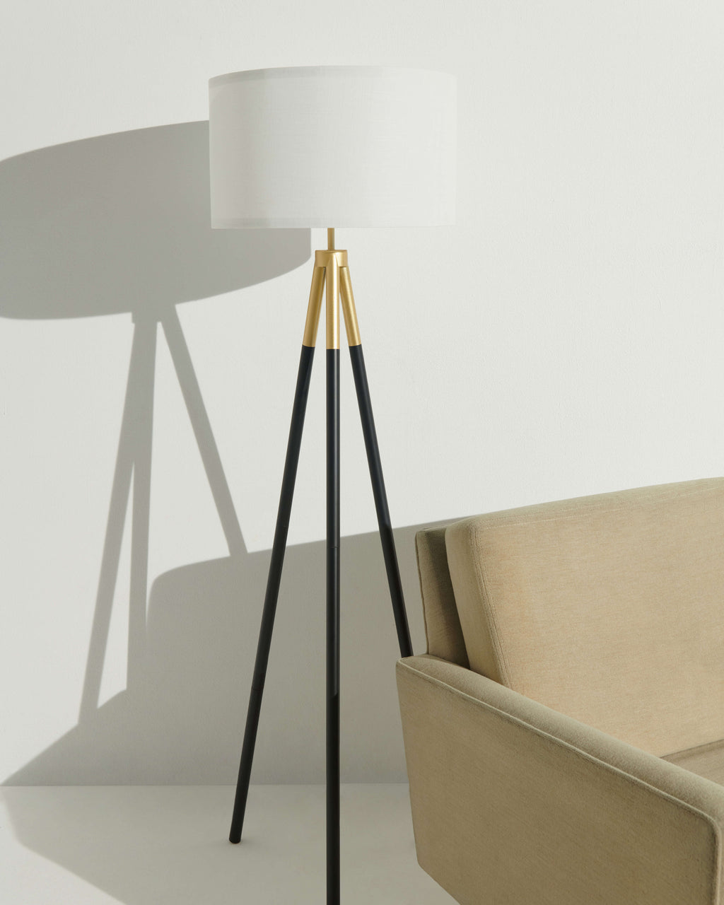 Levi floor lamp with white shade and black tripod legs