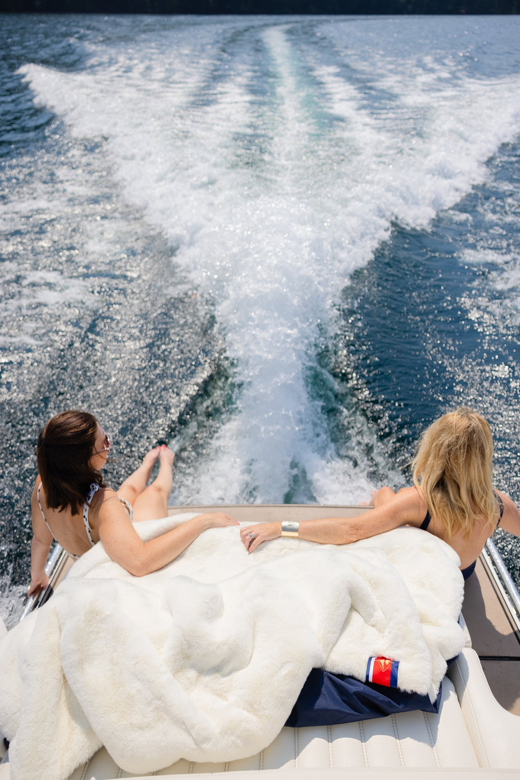 Outdoor blanket on boat, plush off-white fleece texture