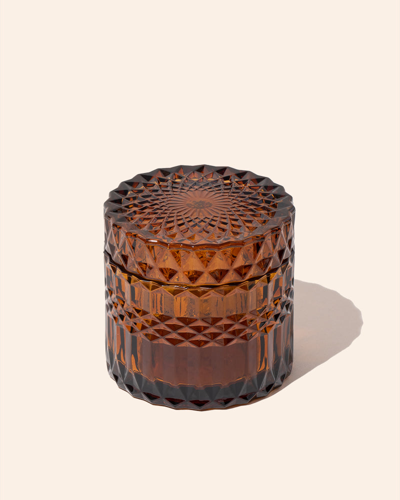Faceted candle vessel with lid, dark amber translucent