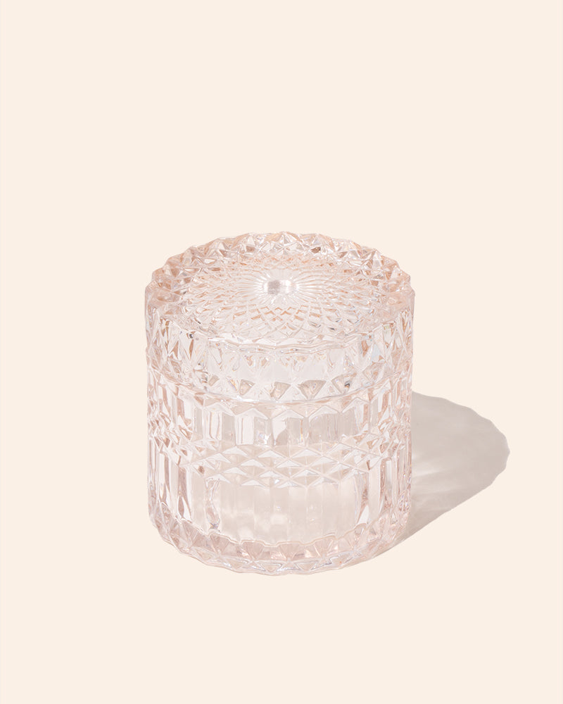 Faceted candle vessel with lid, translucent rose pink
