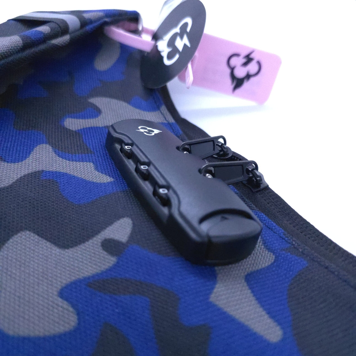 Smell proof crossbody bag front with camo fabric and black locking mechanism