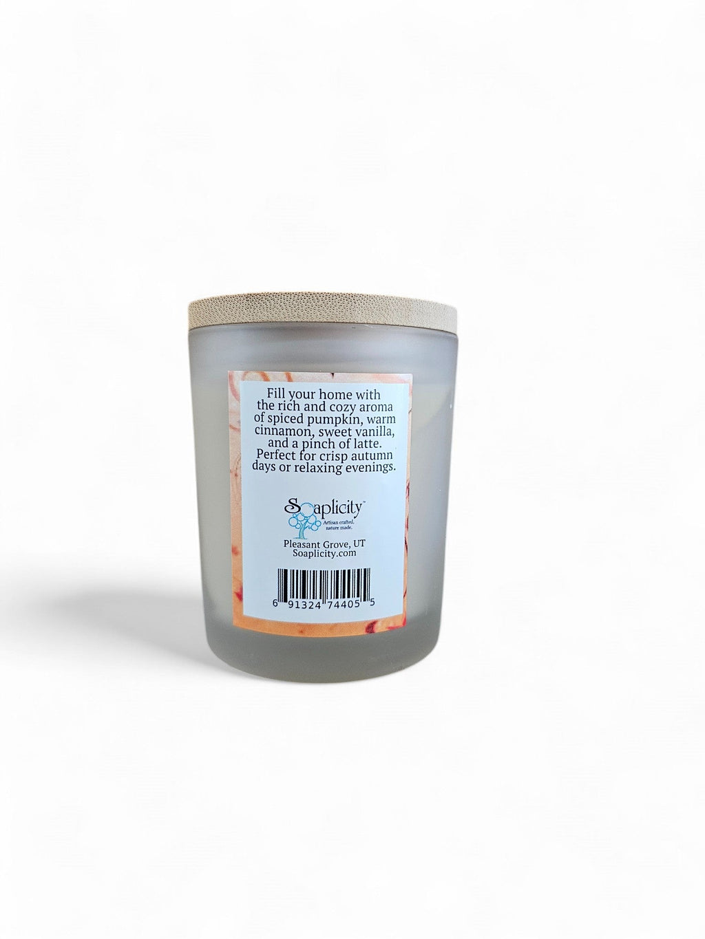 Coconut-soy pumpkin spice latte candle in frosted gray jar with barcode back label, lid on