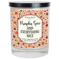 Pumpkin spice scented candle jar with floral label, black lid, and clear glass base.