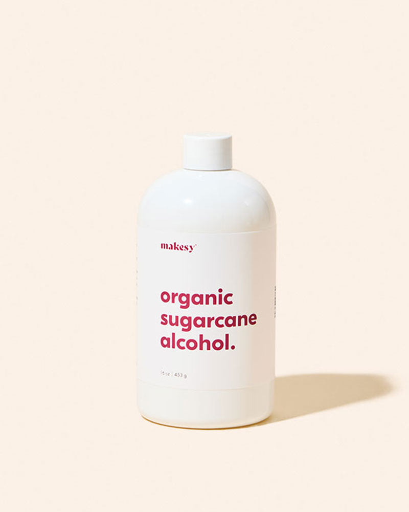 Organic sugarcane alcohol bottle with white cap and white front label